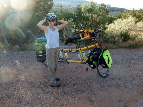 GDMBR: We were ready to pedal; Terry is putting on her helmet.